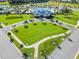 Aerial view showcasing the community park with green spaces and sidewalks on a sunny day at 4407 Palm Shadow Dr, Summerville, SC 29485