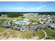 Aerial view showcasing community pool, amenity center, playground and walking paths at 4407 Palm Shadow Dr, Summerville, SC 29485