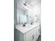 Bathroom featuring double sinks, black accents, and a bright vanity area at 4407 Palm Shadow Dr, Summerville, SC 29485