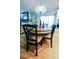 Cozy dining area featuring a round table, seating for four, and modern lighting fixture in light, airy room at 4407 Palm Shadow Dr, Summerville, SC 29485