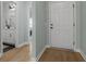 Inviting hallway with hardwood floors leads to the home's various rooms at 4407 Palm Shadow Dr, Summerville, SC 29485
