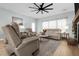 Spacious living room with a ceiling fan and lots of natural light at 4407 Palm Shadow Dr, Summerville, SC 29485