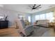 Comfortable living room with a ceiling fan and lots of natural light at 4407 Palm Shadow Dr, Summerville, SC 29485