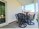Inviting covered patio with outdoor seating, ideal for relaxing and entertaining with convenient access to the backyard at 4407 Palm Shadow Dr, Summerville, SC 29485