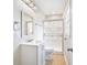 White bathroom with shower, vanity and large mirror at 4767 June St, North Charleston, SC 29405