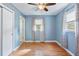 Bright bedroom featuring hardwood floors, ceiling fan and natural light at 4767 June St, North Charleston, SC 29405