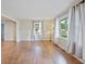 Bright living room featuring hardwood floors, natural light, and neutral paint, creating a welcoming space at 4767 June St, North Charleston, SC 29405