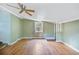 Cozy living area with hardwood floors, a ceiling fan, and a window, offering a comfortable place to relax at 4767 June St, North Charleston, SC 29405