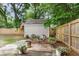 Backyard shed area with sitting area offers functional outdoor space at 5028 Victoria Ave, North Charleston, SC 29405