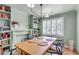 Inviting dining room featuring a wooden table, modern lighting fixture and built-in shelving at 5028 Victoria Ave, North Charleston, SC 29405