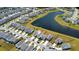 An aerial view of a neighborhood with a pond and well-maintained houses and lawns on a sunny day at 515 Purple Finch Rd, Summerville, SC 29486