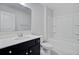 Bathroom featuring single vanity, large mirror, and white tiled flooring at 515 Purple Finch Rd, Summerville, SC 29486