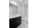 Bathroom featuring single vanity, large mirror, and shower at 515 Purple Finch Rd, Summerville, SC 29486