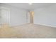 Bright bedroom featuring neutral carpet, light walls, walk-in closet and white trim at 515 Purple Finch Rd, Summerville, SC 29486