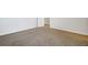Neutral bedroom with tan carpet, white walls and door at 515 Purple Finch Rd, Summerville, SC 29486