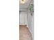 Inviting entryway featuring luxury vinyl plank flooring, neutral paint, and charming floral wreath at 515 Purple Finch Rd, Summerville, SC 29486