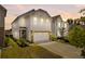 Charming two-story home featuring a two-car garage, manicured lawn, and inviting curb appeal at 515 Purple Finch Rd, Summerville, SC 29486