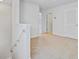 Upstairs hallway features plush carpeting, neutral paint, and access to the bedrooms and bathrooms at 515 Purple Finch Rd, Summerville, SC 29486