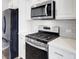 Gourmet kitchen featuring stainless appliances, gas range, and ample counter space at 515 Purple Finch Rd, Summerville, SC 29486