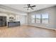 Open-concept living space with modern finishes, wood flooring, and large windows at 515 Purple Finch Rd, Summerville, SC 29486