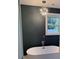 Stylish bathroom features a modern free-standing tub and a decorative chandelier at 5513 Blackwell Ave # A, North Charleston, SC 29406