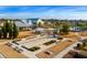 Community featuring manicured bocce ball courts, a clubhouse, and a pool with ample seating at 6016 Wild Azalea Rd, Summerville, SC 29483