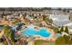 Resort-style community featuring a sparkling pool, clubhouse, and meticulously maintained landscaping at 6016 Wild Azalea Rd, Summerville, SC 29483