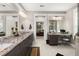 Spacious bathroom featuring dual sinks, granite countertops, and a view to the bedroom at 6016 Wild Azalea Rd, Summerville, SC 29483