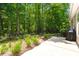 Relaxing backyard featuring a patio area with a grill, perfect for outdoor dining and entertaining at 6016 Wild Azalea Rd, Summerville, SC 29483