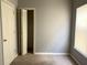 Bright bedroom space with closet and window, ready for personalization at 7 Dingle St, Charleston, SC 29403