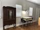 Dining area with hardwood floors, a vintage table set, and classic china cabinet at 7 Dingle St, Charleston, SC 29403