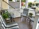 Inviting porch with cushioned seating and ample space to enjoy neighborhood views at 7 Dingle St, Charleston, SC 29403