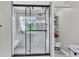 Modern bathroom featuring glass enclosed shower and a built-in bench at 7644 High Maple Cir, North Charleston, SC 29418