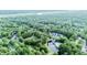 Scenic aerial view of the community, showcasing lush greenery, water features, and peaceful surroundings at 7950 Parklane Ct # C, North Charleston, SC 29418