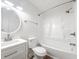 Bright bathroom featuring a shower-tub combo, white vanity, and modern fixtures providing a practical, relaxing space at 7950 Parklane Ct # C, North Charleston, SC 29418