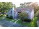 Inviting multi-Gathering home with well-manicured landscaping, ample parking, and blossoming trees creating a welcoming environment at 7950 Parklane Ct # C, North Charleston, SC 29418
