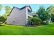 Well-maintained condo building surrounded by lush green lawns at 7950 Parklane Ct # C, North Charleston, SC 29418