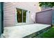 Outdoor patio area with sliding glass door access to living space at 7950 Parklane Ct # C, North Charleston, SC 29418