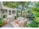 Outdoor patio featuring a screened porch and outdoor furniture, perfect for entertaining and relaxing at 938 Sea Gull Dr, Mount Pleasant, SC 29464