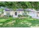 Beautiful single-story home framed by mature trees and a well-manicured front yard at 938 Sea Gull Dr, Mount Pleasant, SC 29464