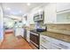 Well-equipped kitchen with granite countertops and stainless steel appliances, ideal for cooking and entertaining at 938 Sea Gull Dr, Mount Pleasant, SC 29464
