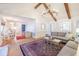 Open-concept living room showcasing hardwood floors, natural light, and a seamless flow to the dining area at 938 Sea Gull Dr, Mount Pleasant, SC 29464