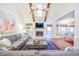 Bright living room boasting a vaulted ceiling, stone fireplace, and open layout perfect for entertaining guests at 938 Sea Gull Dr, Mount Pleasant, SC 29464