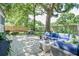 Cozy patio space featuring comfortable outdoor furniture, a lush garden, and space for relaxing in the sun at 938 Sea Gull Dr, Mount Pleasant, SC 29464