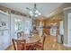 Eat-in kitchen boasting ample counter space, stainless steel appliances, and a view of the backyard at 1004 Providence Way, Summerville, SC 29483