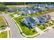 Aerial view of neighborhood showcasing the well-maintained lawns, sidewalks, and manicured landscaping at 101 Guernsey Ln, Summerville, SC 29483