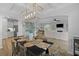 Open-concept dining room with views of the living room and kitchen; features elegant decor at 101 Guernsey Ln, Summerville, SC 29483