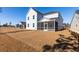 Spacious backyard featuring a screened porch and view of surrounding homes at 1029 Riverbed Retreat Ln, Summerville, SC 29485