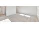 Bright, neutral bedroom with plush carpeting and ample natural light at 1029 Riverbed Retreat Ln, Summerville, SC 29485
