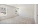 Bright, airy bedroom featuring neutral carpet, and a window showcasing lake views at 1029 Riverbed Retreat Ln, Summerville, SC 29485